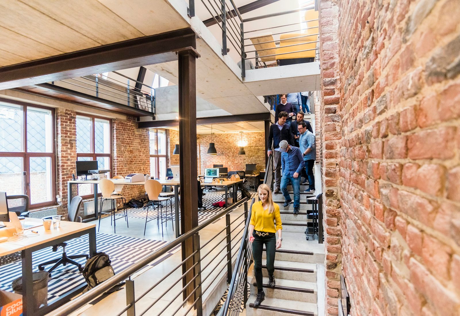 Modern workspace with people collaborating